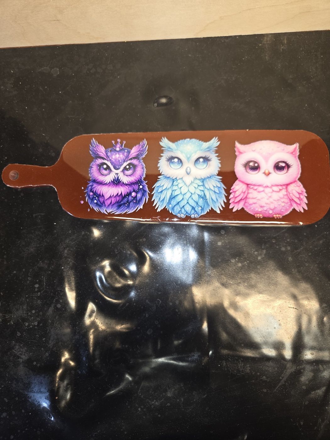 Small paddle board with three cute owls