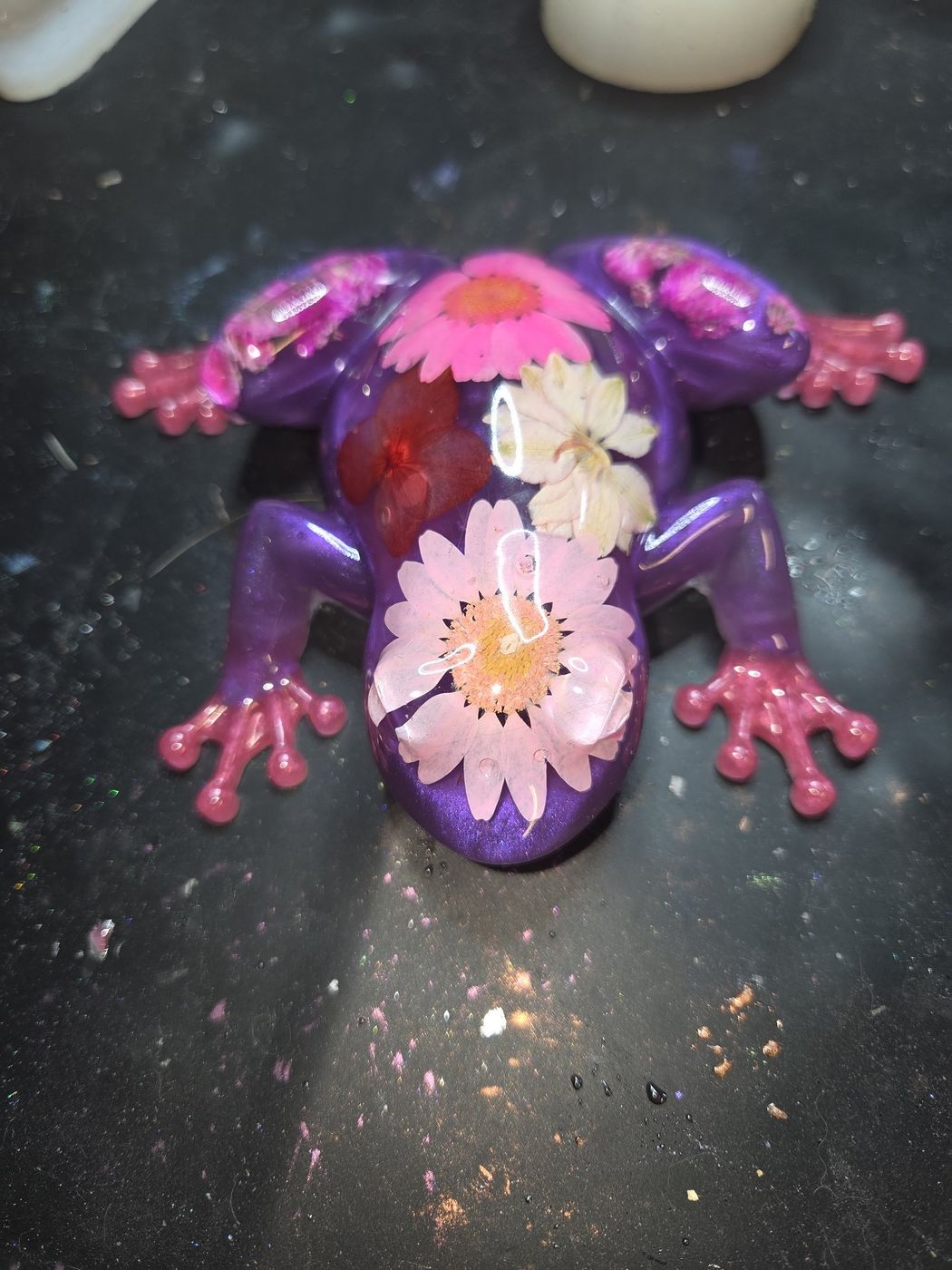 Purple resin frog with pressed flowers