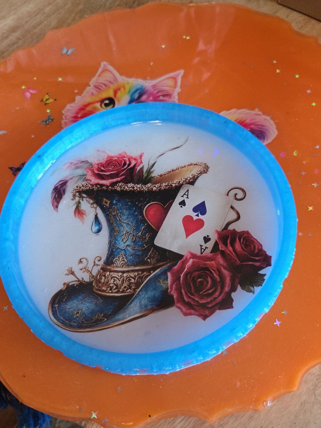 Round tray with mad hatter top hat, roses, and playing cards